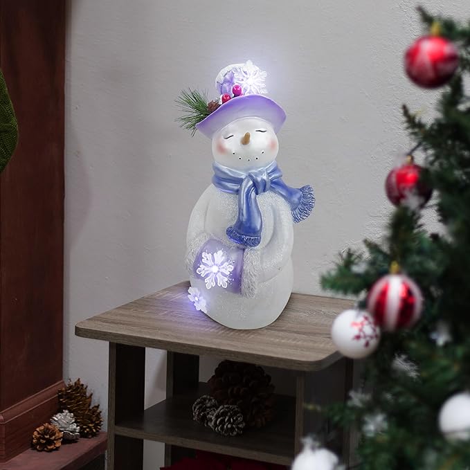 Alpine Corporation SKY560HH-S, Lavender Winter Snowman Statue w/Hand Muff, Twinkle LED Lights, Battery w/Timer, 14" H - Tabletop, Mantel, Yard, or Porch Décor, Christmas Decoration